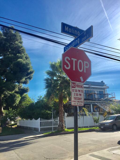The property is next to this blue house at the Conner of Spaulding St and Molino Ave. Please turn into Molino Ave. pass this blue house and one more house, then turn left into the alley to the garages