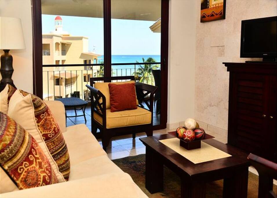 Bright living area with sliding doors to main balcony