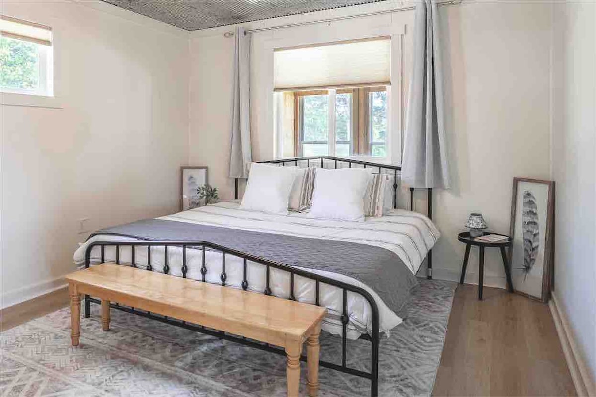 Primary bedroom with king bed. 