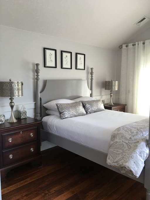 Soft grays surround you in this bright, clean and private master suite.