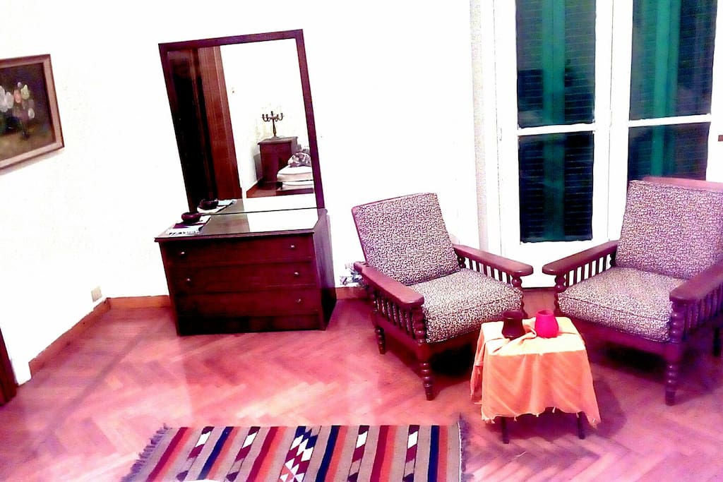 Balcony door + 2 cozy seats + coffee table