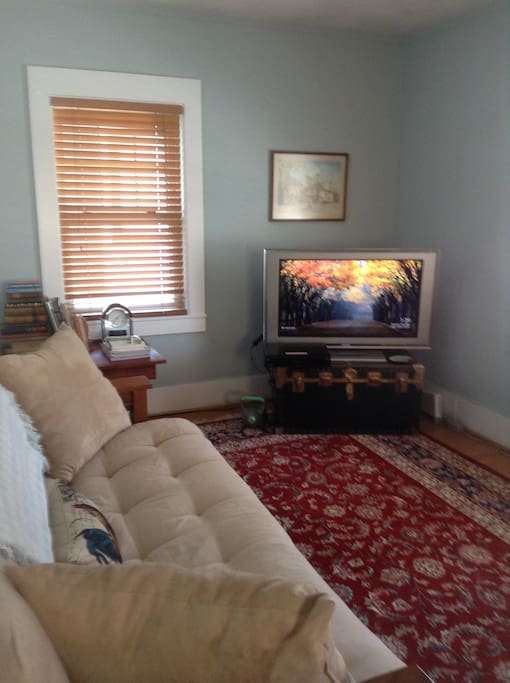 Living room (futon sofa ). 42" TV