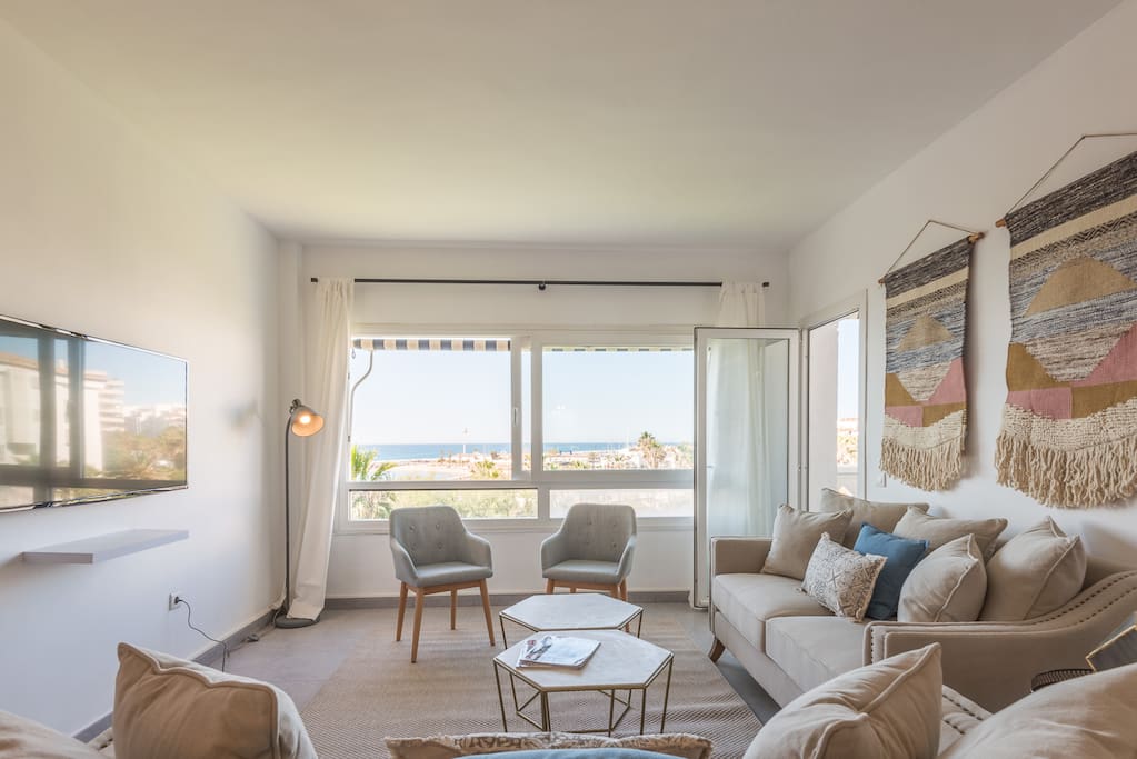Bright and comfortable living room with a privilege seaview