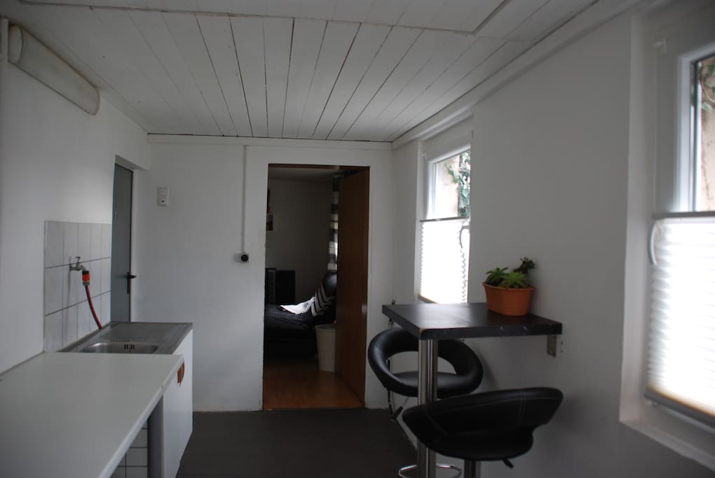 big room ahead, bathroom left