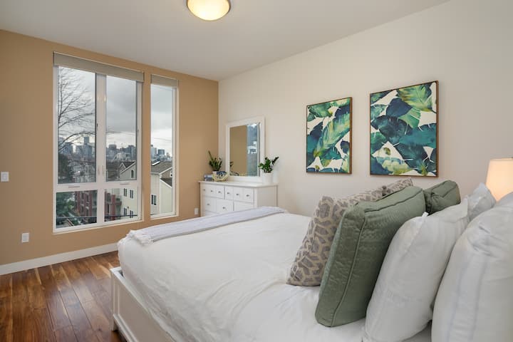 Master bedroom with city and Space Needle views.