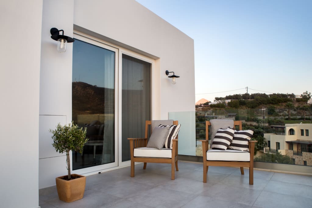 Comfortable seating on the balcony to enjoy the views