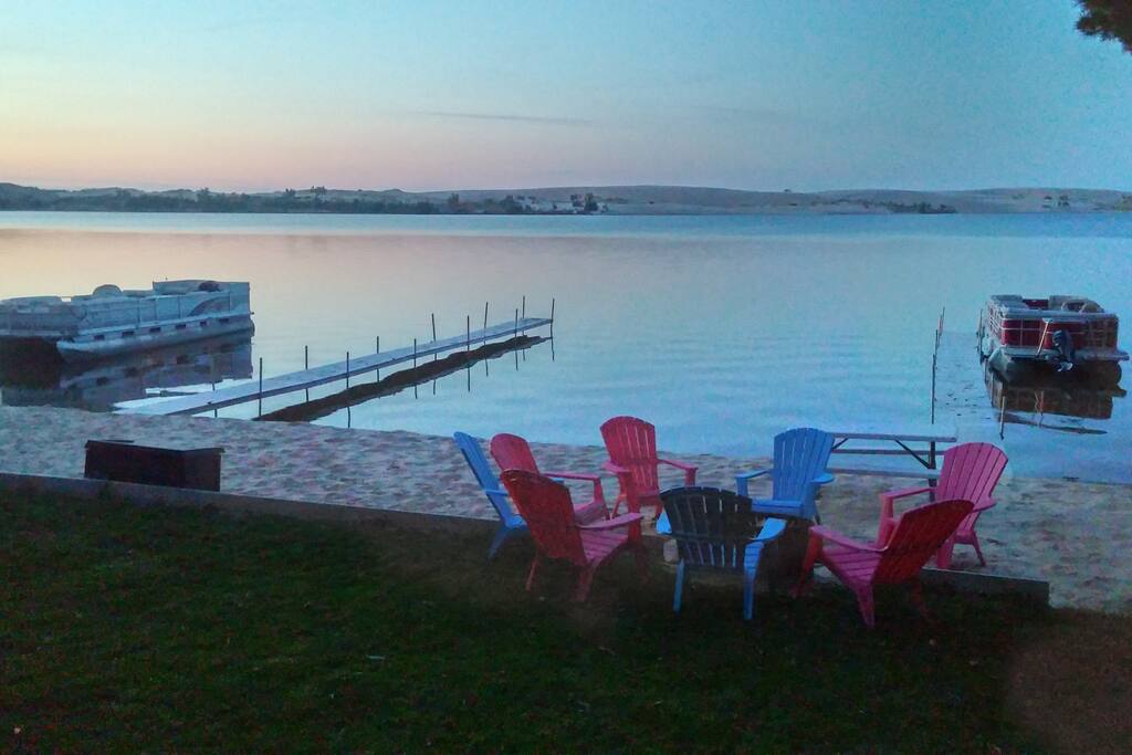 Directly on your own private beach with 3 fire pits and 3 private docks.