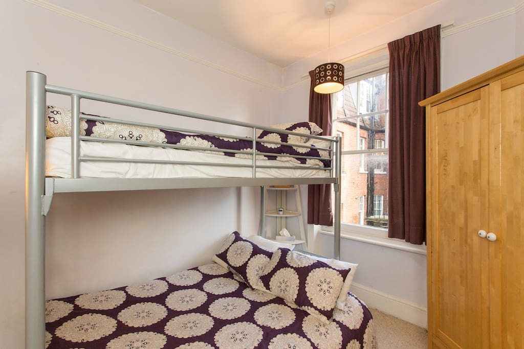 Your room - which fits three people - two on bottom and one on top