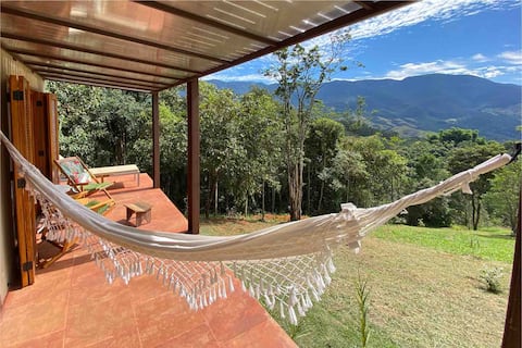 Cafofo chic super view of the mantiqueira and waterfall