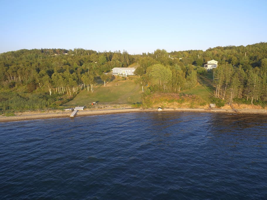 home with wharf and beach