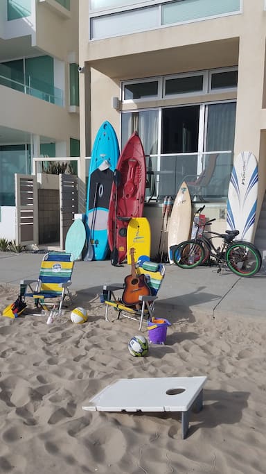 Kayaks, surfboards, stand up paddleboard (SUP), bikes, guitar, volleyball, games, toys...only thing missing is YOU!