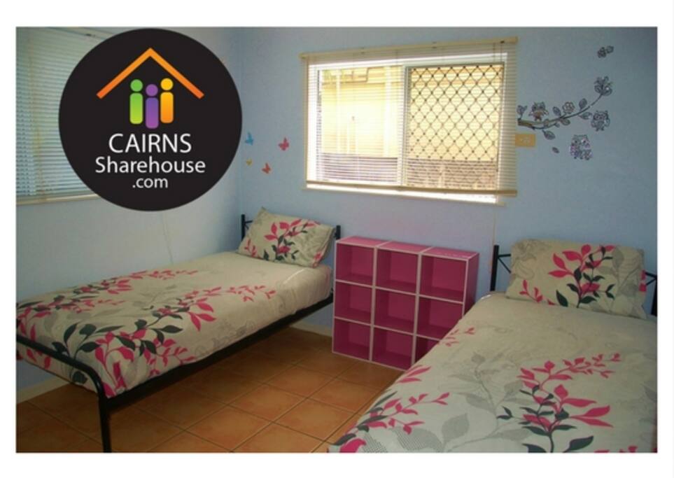 Adorable room with 2 single beds