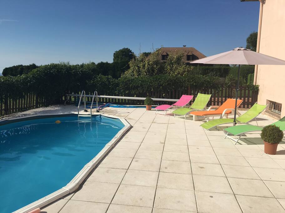 Paved Pool with sunbeds