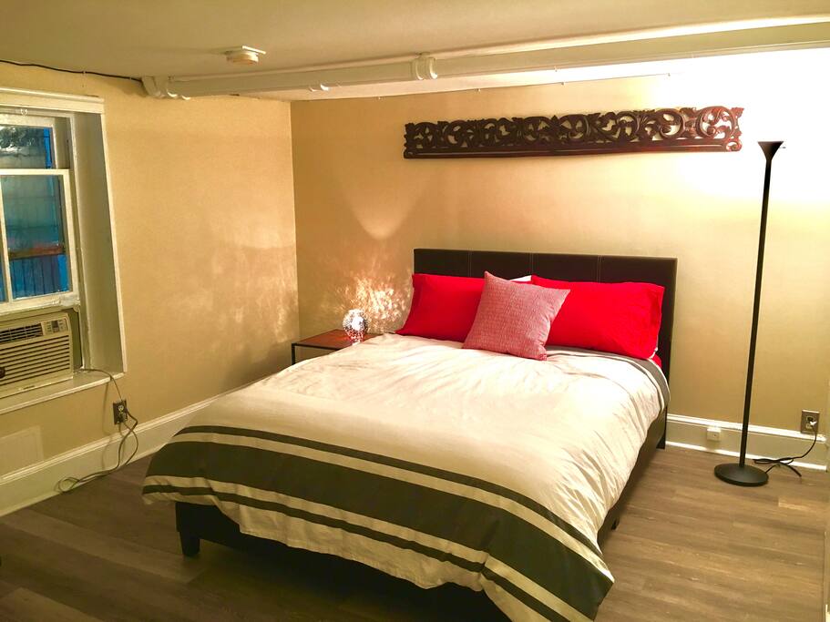 Queen sized bed with luxurious pillow top mattress