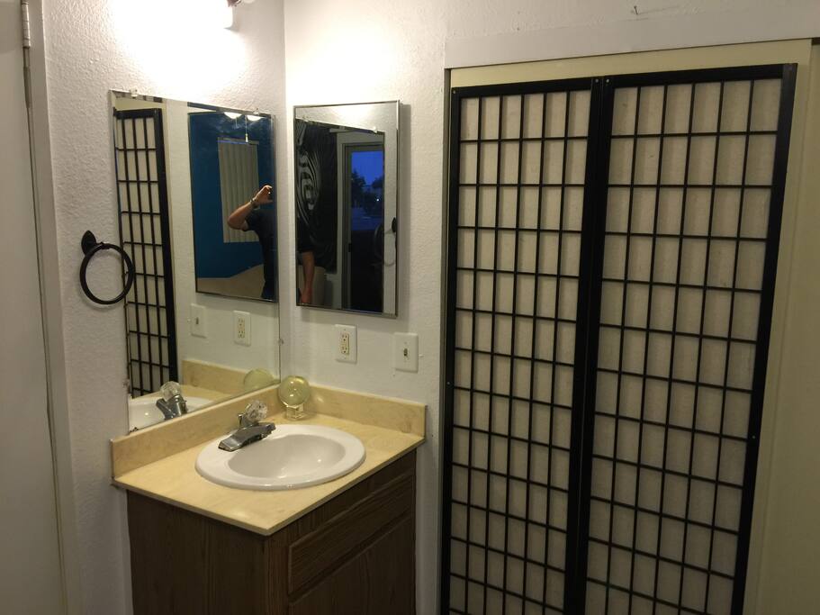 Sink and vanity in room