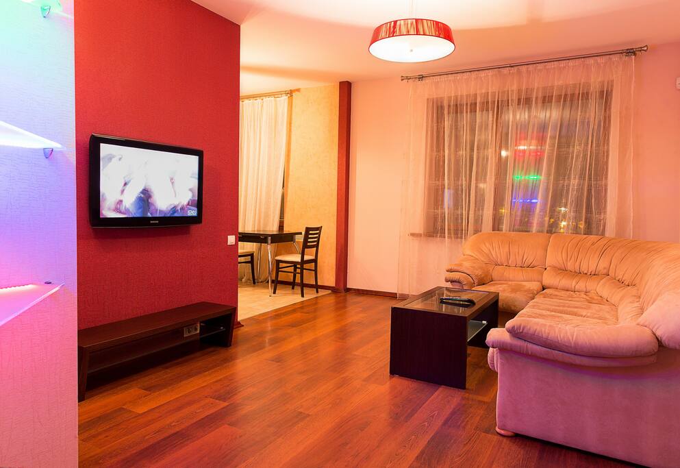 Living room and we can see kitchen