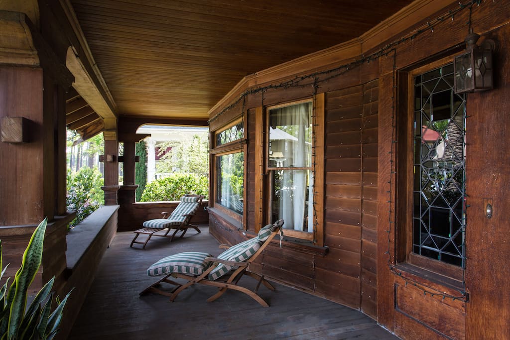 Grab a cool drink and lounge on our front porch after a day exploring in the city .