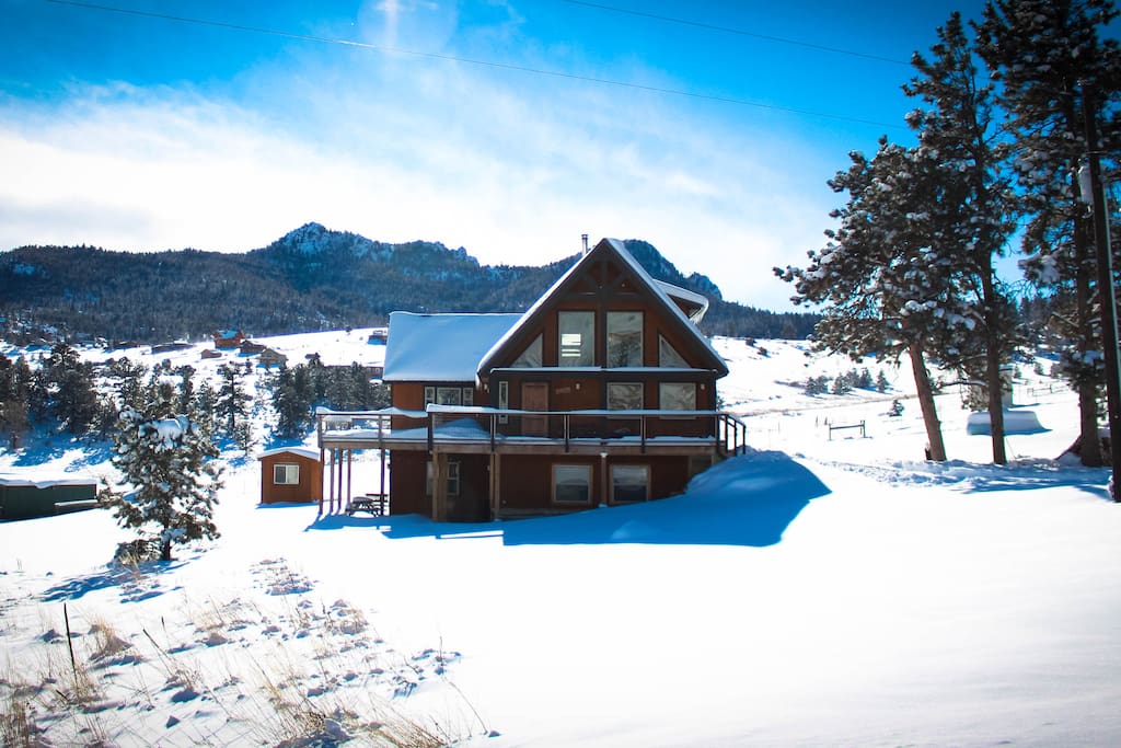 The Mountain House is a cozy mountain chalet with 4 bedrooms and 3 baths.