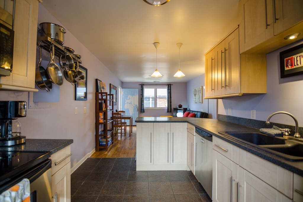 Full size refrigerator and modern kitchen.
