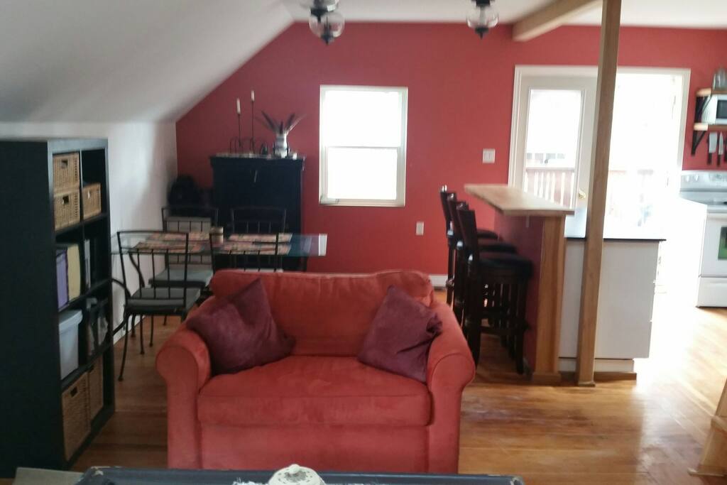 Dining area and loveseat.