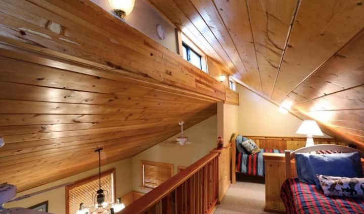 Loft with two twin beds and space for sleeping bags