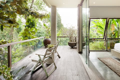 Cliff-Top Villa Surrounded by Tropical Greenery