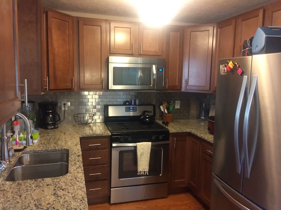 Kitchen with gas stove and new appliances