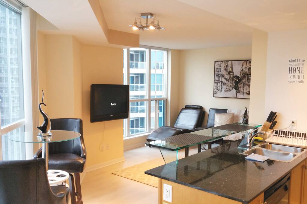 Kitchen, Wine lounge and Living space
CN tower & Rogers Centre view throughout suite