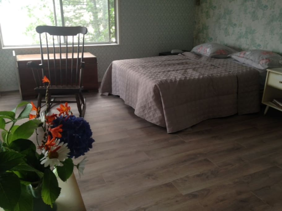 The front bedroom sleeps offers a double bed, a balcony, and a breathtaking view.