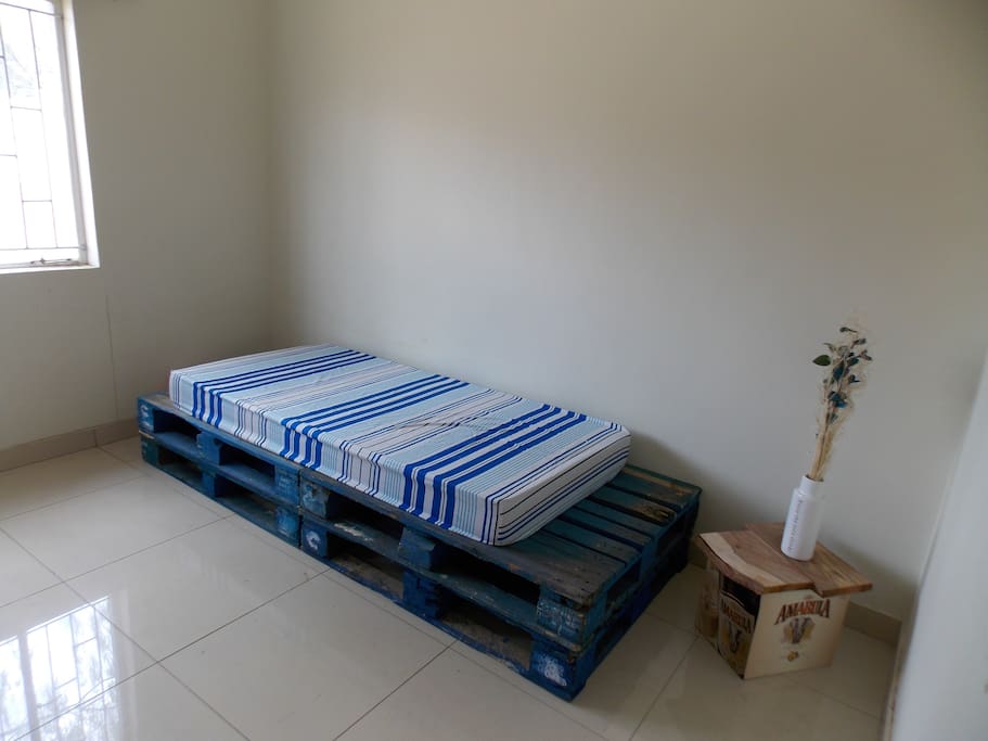 Furnished available room with single bed