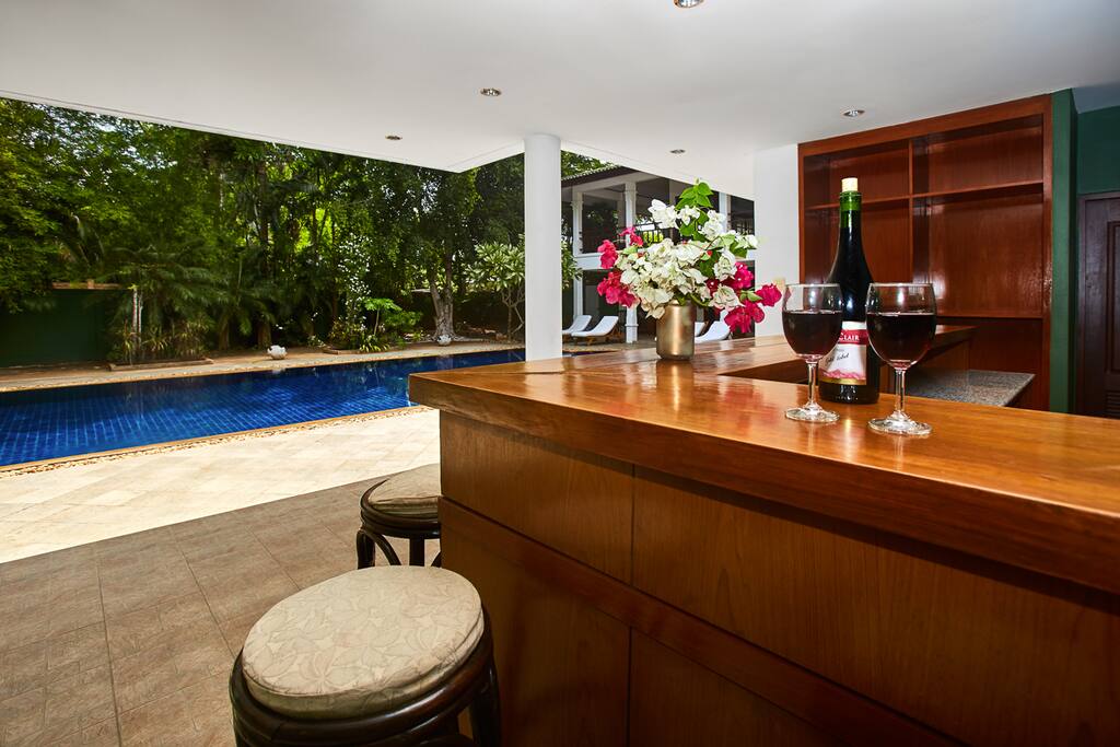 swimming pool
outdoor furniture
bar