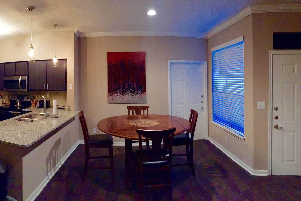 View of Dining Area with Door to Attached Garage