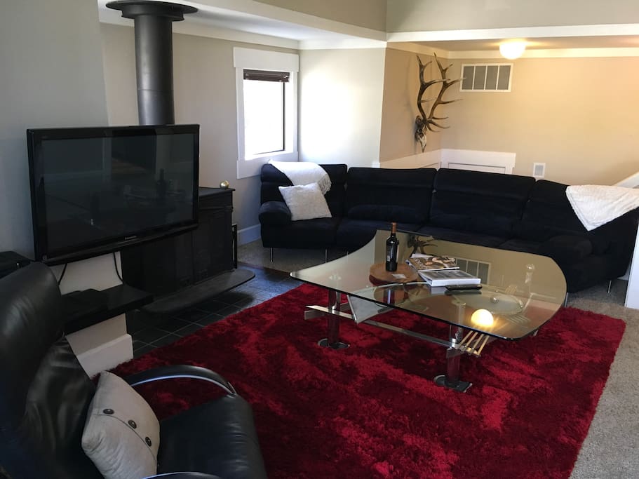 The living room is complete with a flat screen TV on a pivot mount allowing you to enjoy from anywhere in the room including the hot tub!