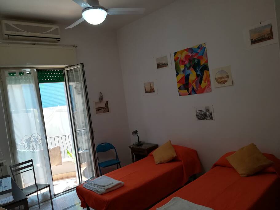 The room with two beds and the new ceiling fan!