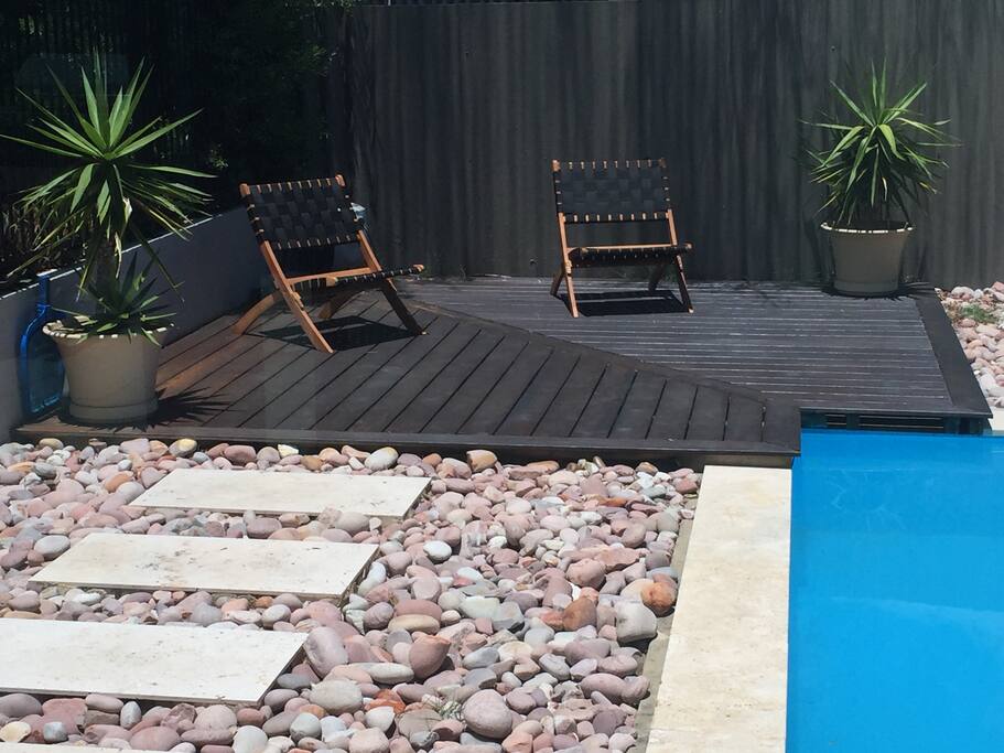 Lounging chairs on the pool deck.