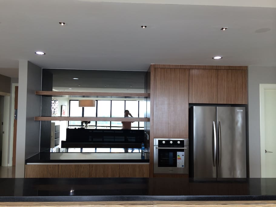 Functional dry kitchen with twin door fridge and oven