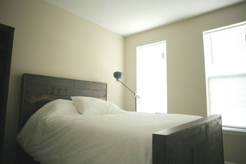 Raised queen bed. Custom built.