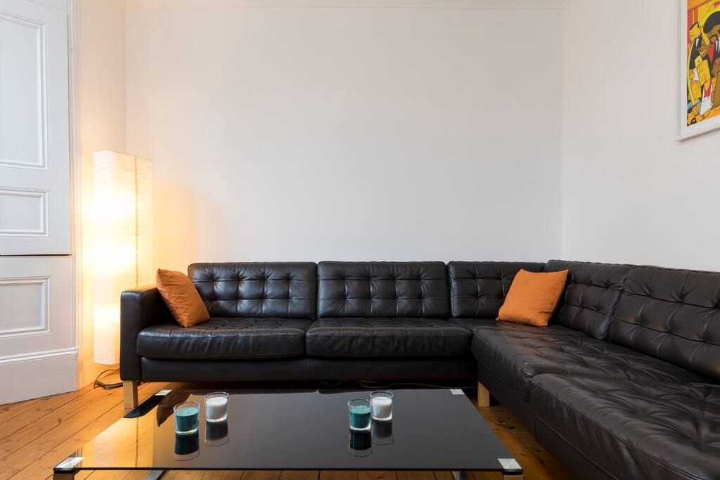 Relax on the huge L-shaped sofa.