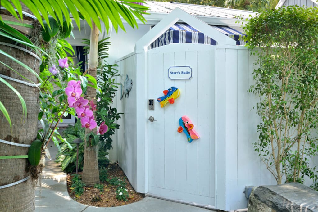 Gate to Starr's Suite with Morris Johnson folk art fish! Starr's electronic gate and door code are the same.