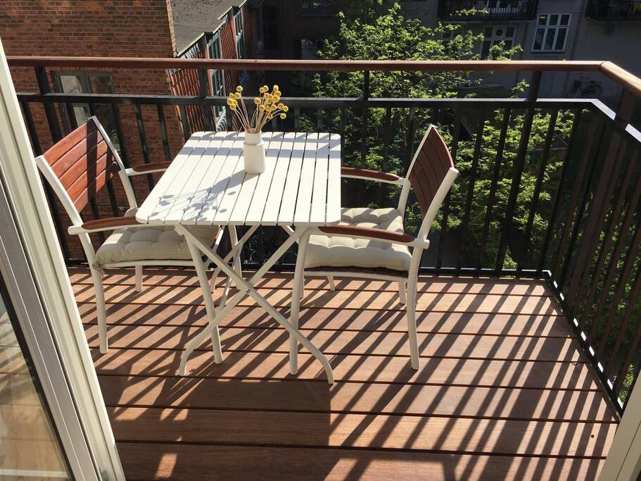 The balcony with a view of the green patio