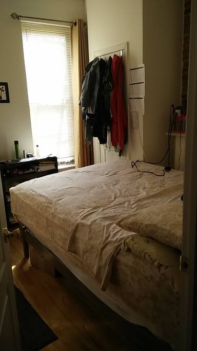 This is the bedroom for up to 2 people. Queen Size bed, desk, chair, chest drawer, closet and an antique non-functional fireplace.