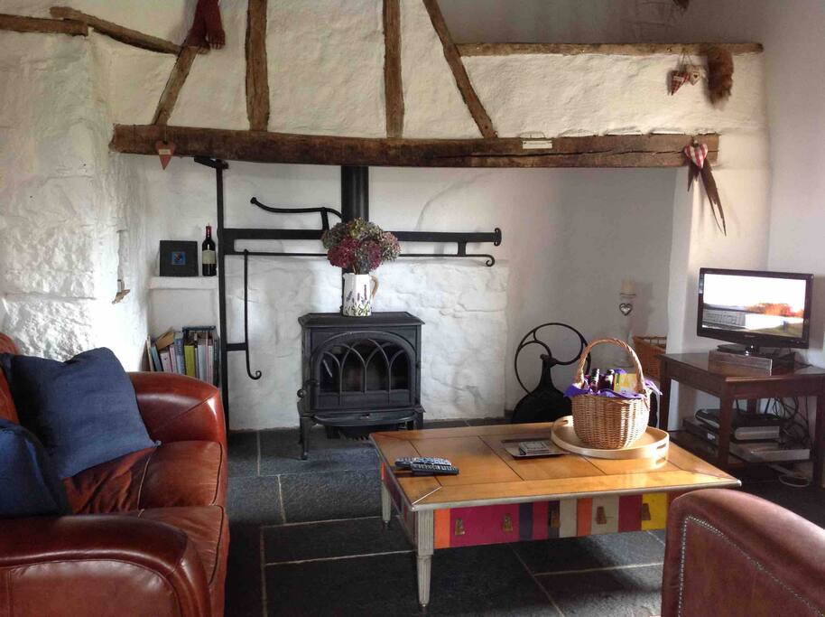 Comfy reception room with log burning stove, free wifi, cable tv