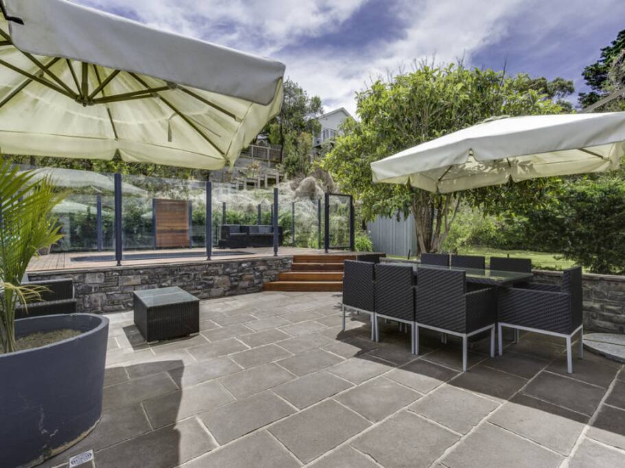 Paved outdoor area with pool