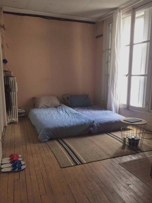Bed with window facing the beautiful courtyard so you can sleep quietly