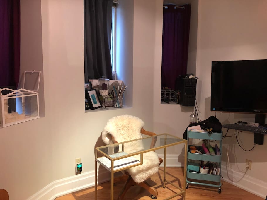 Writing desk in living room useful for getting simple tasks done. Not pictured is separate office/den with upright piano.