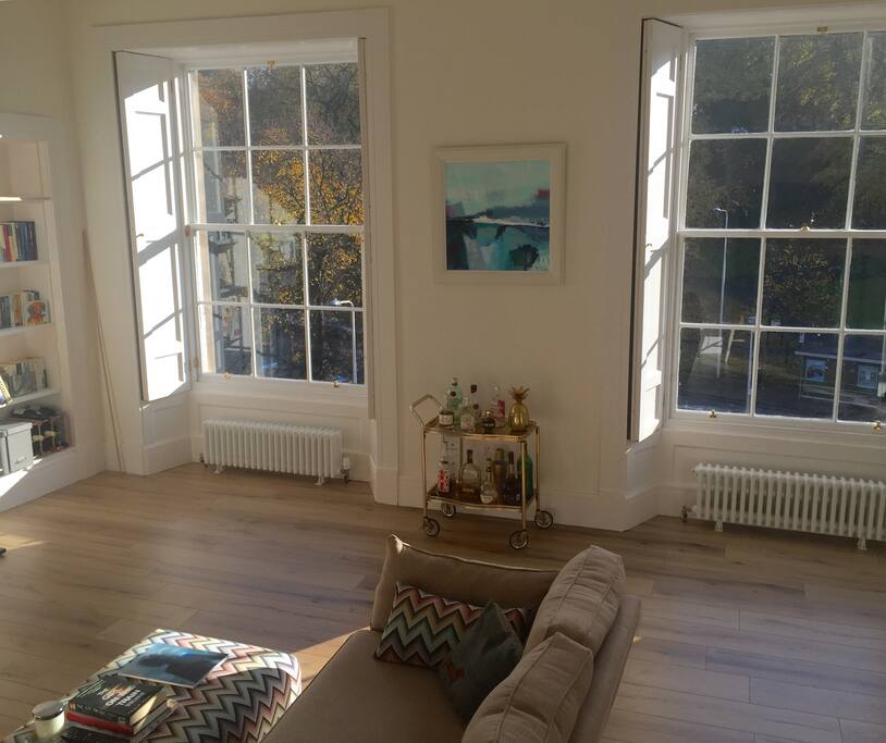 Huge windows letting lots of light and sunshine in