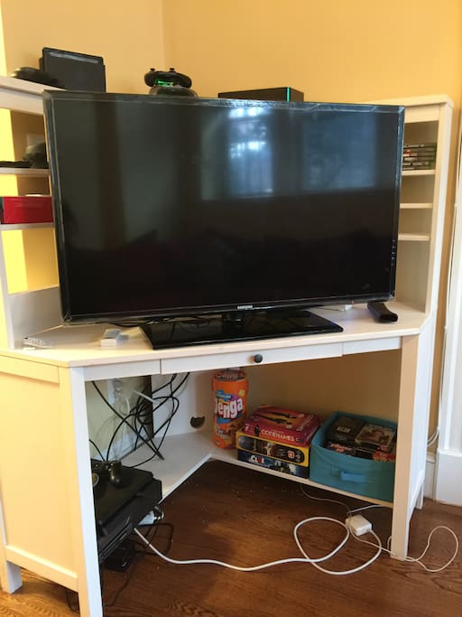 TV with cable, wifi, game systems and board games