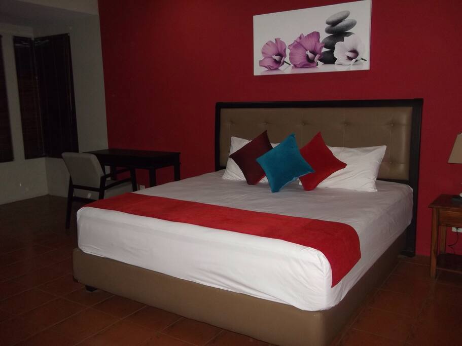 Master Bedroom.. Super King size Bed (200x200cm) ensuite bathroom. With pool view.