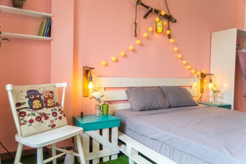 Bedroom on the third floor with balcony overlooking West Lake