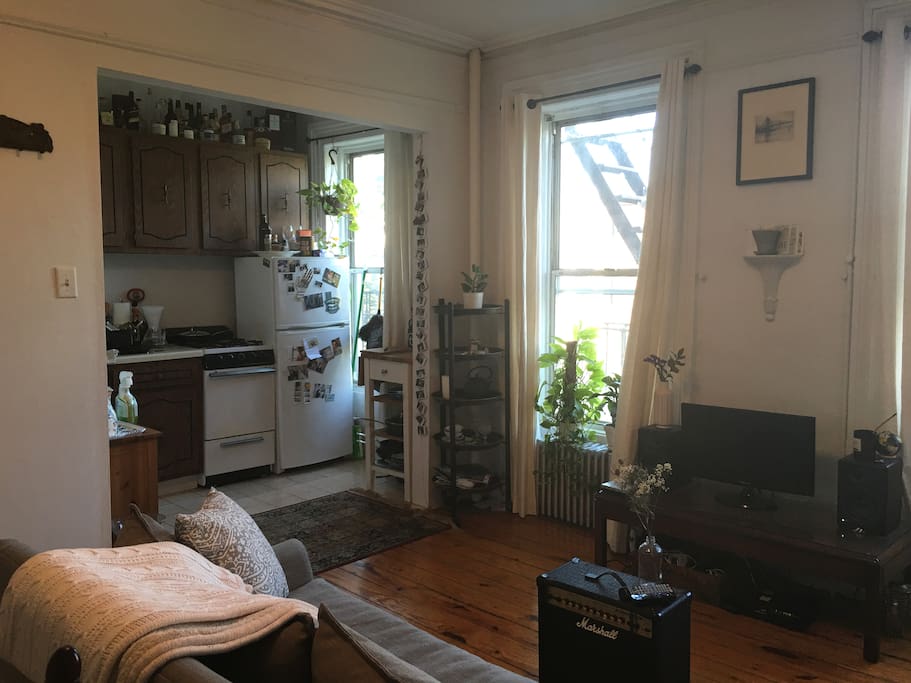 Living room w/ connected kitchen area